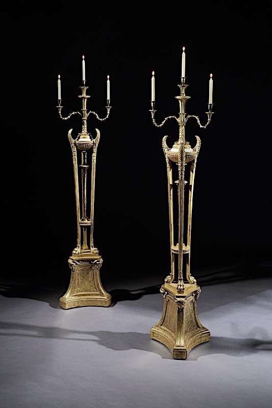 A PAIR OF GEORGE III TORCHÈRES ATTRIBUTED TO ROBERT ADAM AND THOMAS CHIPPENDALE 